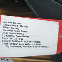 16.5 adj *set *5.5" Schleese Obrigado Monoflap Dressage Saddle, Navy Schleese Cover, Wool Flocking, Shoulder Relief Panels, Rear Gusset Panels, Lg External Front Blocks, Flaps: 16"L x 10"W Serial #: O-SHW B2 16.5 M05835S0324