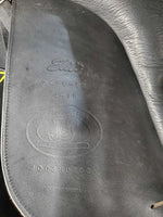 18" ?Adj *set W 6" Schleese Elite Dressage Saddle, Navy Schleese Cover, 2 XLg Front Velcro Blocks, Obrigado Panels, Wool Flocking, Rear Gussets, Shoulder Relief Cutouts, Flaps: 17"L x 13.5"W Serial #: 6-RW-SR 4-18 4003H0203