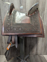 14" Silver Cloud Peruvians Show Saddle: 3 pads, 2 wool/1 Corona (leather), Tapacola(tail), Batacola(crupper), Cruzeta(connector), Retrancas(straps), Stirrups, latigos, String Cinch, Breastplate, Headstall, Hackamore, Reins, Tapa Ojos (eye covers), Bag