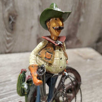 Long Bow Legged Cartoon Cowboy Statue *vgc, dusty, broken cactus arm
