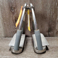 Pr Flexi Stirrup Irons, Adj Tops, 2 Grips: Wide & Reg *vgc, clean & mnr dirt?residue, scratches
