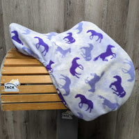 17" W *6" Courbette Close Contact Saddle, 2 Billet Guards, Purple Fleece Cover, Foam Panels, Med Front Pencil Rolls, Rear Gusset Panels, Flaps: 14"L x 13"W Serial #: 901975
