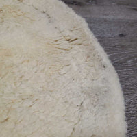 Sheepskin Quilt Half Pad, rolled edges *gc, clumpy, mnr hair, dirt, puckers, faded, threads, undone stitch, rubs