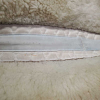 Sheepskin Half Pad *fair, clean, large bare spots, stains, clumpy, dingy, pills, mnr puckers, threads