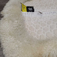 Sheepskin Half Pad *fair, clean, large bare spots, stains, clumpy, dingy, pills, mnr puckers, threads