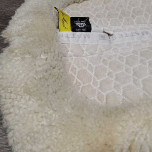 Sheepskin Half Pad *fair, clean, large bare spots, stains, clumpy, dingy, pills, mnr puckers, threads