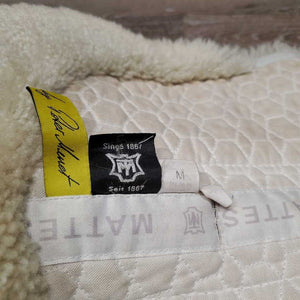 Sheepskin Half Pad *fair, clean, large bare spots, stains, clumpy, dingy, pills, mnr puckers, threads