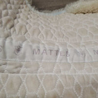 Sheepskin Half Pad *fair, clean, large bare spots, stains, clumpy, dingy, pills, mnr puckers, threads
