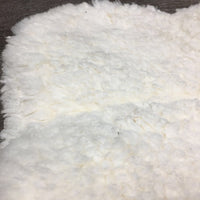 Sheepskin Quilt Half Pad, rolled edges *vgc, clean, v. clumpy, mnr stains, hair, threads