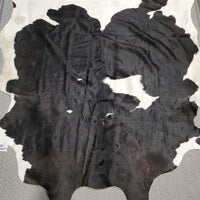 Cowhide Rug *xc/vgc, mnr dirt, curled edges