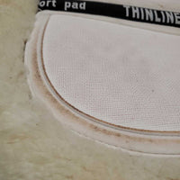 Shimmable Sheepskin Quilt Half Pad, rolled edge *gc, clean, 0 shims, cut tabs, v. stiff, shrunk, puckers, clumpy, mnr stains, pills, threads
