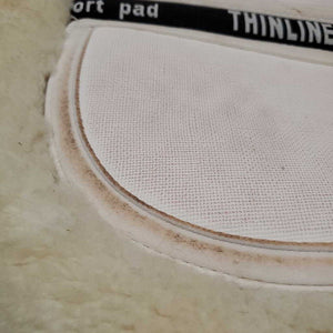 Shimmable Sheepskin Quilt Half Pad, rolled edge *gc, clean, 0 shims, cut tabs, v. stiff, shrunk, puckers, clumpy, mnr stains, pills, threads