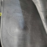 18" ?Adj *set W 6" Schleese Elite Dressage Saddle, Navy Schleese Cover, 2 XLg Front Velcro Blocks, Obrigado Panels, Wool Flocking, Rear Gussets, Shoulder Relief Cutouts, Flaps: 17"L x 13.5"W Serial #: 6-RW-SR 4-18 4003H0203