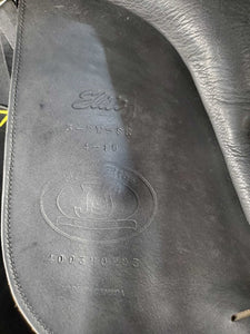 18" ?Adj *set W 6" Schleese Elite Dressage Saddle, Navy Schleese Cover, 2 XLg Front Velcro Blocks, Obrigado Panels, Wool Flocking, Rear Gussets, Shoulder Relief Cutouts, Flaps: 17"L x 13.5"W Serial #: 6-RW-SR 4-18 4003H0203