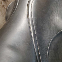 18" ?Adj *set W 6" Schleese Elite Dressage Saddle, Navy Schleese Cover, 2 XLg Front Velcro Blocks, Obrigado Panels, Wool Flocking, Rear Gussets, Shoulder Relief Cutouts, Flaps: 17"L x 13.5"W Serial #: 6-RW-SR 4-18 4003H0203

