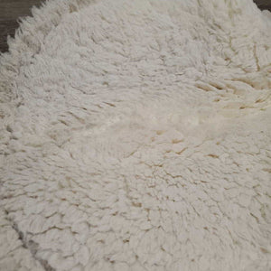 Sheepskin Quilt Hunter Half Pad *gc, cut tabs, v. clumpy, puckers, stains, mnr hair, pills, marker, dirt