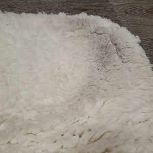 Sheepskin Quilt Hunter Half Pad *gc, cut tabs, v. clumpy, puckers, stains, mnr hair, pills, marker, dirt