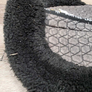 Quilt Sheepskin Half Pad, rolled edge *gc, clean, v. faded, stains, mnr hair, stiff, clumpy, rubs, hole