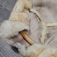 Sheepskin Saddle Seat Cover *fair/poor, converted jacket? stains, clumpy, holes, thins spots, rubber tubing
