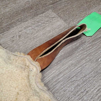 Sheepskin Saddle Seat Cover *fair/poor, converted jacket? stains, clumpy, holes, thins spots, rubber tubing
