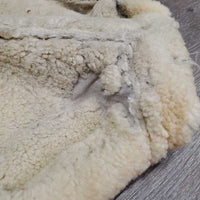 Sheepskin Saddle Seat Cover *fair/poor, converted jacket? stains, clumpy, holes, thins spots, rubber tubing
