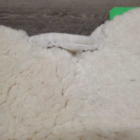 Quilt Sheepskin Half Pad, rolled edge *gc/fair, dirt, stains, dingy, puckers, cut tabs, clumpy, pills, torn edges
