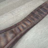 Narrow Thin Padded Leather Girth, els *gc/fair, clean, stiff, v.torn & stretched els, creases, dry, hairy seams, older
