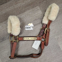 Triple Stitch Leather Halter, 2 Sheepskin Covers, nameplate *vgc, mnr dirt, older?, stains, creases, edge scrapes
