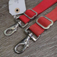 2 elastic Leg Straps *1: like new, 1: gc, dirty, rubs, stains, mismatched
