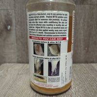 M-T-G Solution *2/3 full, marker, mnr dirt/scuffed bottle, thick/hvy bottom product. - wont mix in
