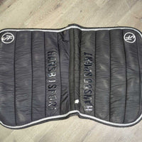Channel Quilt Jumper Pad, non slip, 2x piping *gc, clean, puckers, curled edges, warp, rubs, threads, mnr hair, pills, snags, loose embroid.
