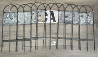 12 Metal Push In Arena Letters, box *gc, v.faded, rubs, scrapes, stains, rust, ribbon, LETTERS: v.peeled & missing
