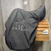17" MW *5.25" County Fusion Dressage Saddle, Black County Saddle Cover, Xlg Exterior Front Blocks, Rear Gusset Panels, Wool Flocking, Flaps: 17"L x 11"W Serial #: 17W 2 16060679
