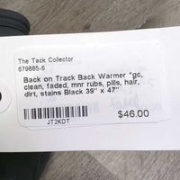 Back Warmer *gc, clean, faded, mnr rubs, pills, hair, dirt, stains

